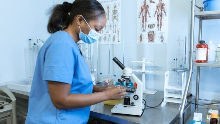 Career in science: female scientists working in lab
